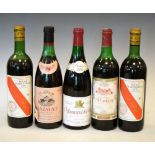 Five bottles of French red wine