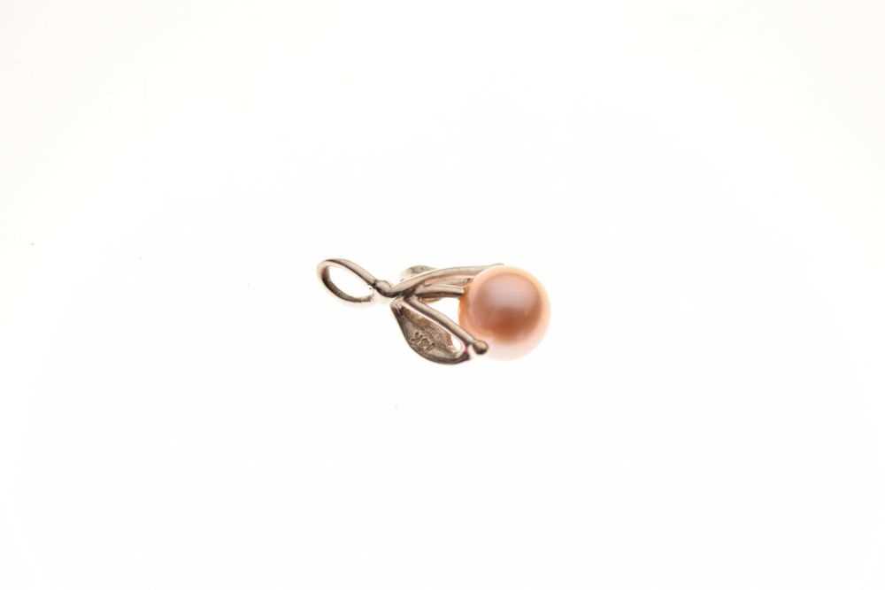 White metal and cultured pearl pendant stamped '14k', together with a similar pair of stud earrings, - Image 4 of 4