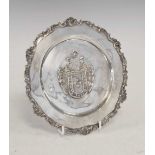 Peruvian silver presentation dish having embossed coat of arms of Lima