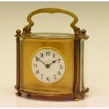 Early 20th Century brass oval carriage timepiece