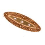 Late Victorian 15ct gold brooch, set with three diamonds