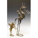Two African metal sculptures of mounted riders