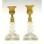 Pair of crystal glass candlesticks with bronze sockets