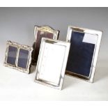 Four modern silver photograph frames