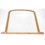 Large arched giltwood overmantel mirror