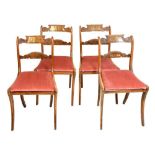 Set of four Regency rosewood and brass inlaid chairs