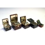 Five late 19th and early 20th Century travelling inkwells, - travelling cases