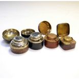 Four late 19th or early 20th Century morocco covered travelling inkwells