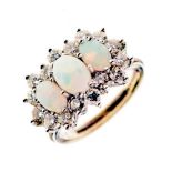 18ct white gold, opal and diamond cluster ring