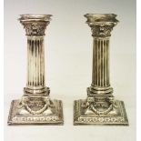 Pair of silver Victorian neo-classical candlesticks of Corinthian column form