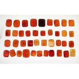 Collection of forty rectangular carnelian intaglios