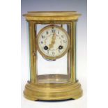 Late 19th or early 20th Century French oval four glass mantel clock