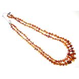 Two-row amber graduated bead necklace