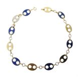 Yellow metal necklace with alternating blue and white enamel oval links