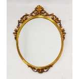 Italian ornate gilt oval wall mirror