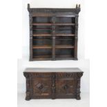 Carved oak 'Jacobethan' bookcase on cabinet