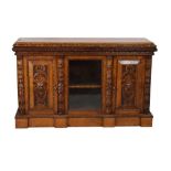 Late Victorian carved oak side cabinet
