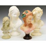 Four plaster busts