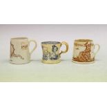 Three commemorative mugs
