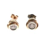 Pair of 9ct gold, illusion set diamond ear studs