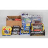 Quantity of boxed diecast model vehicles to include; Corgi, Maisto, Burago, EFE, etc.