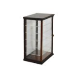 Glass and mahogany framed countertop display cabinet