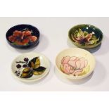 Moorcroft Pottery - Group of four small dishes