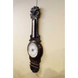 Early 20th Century carved oak aneroid barometer