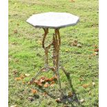 Octagonal marble top garden table on a white painted cast iron base