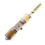 Bucherer - Small cylindrical lady's pendant watch