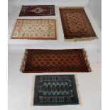 Five small Middle Eastern style rugs