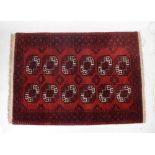 Middle Eastern Tekke or Belouch red ground rug