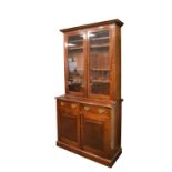 Early 20th Century mahogany bookcase on cabinet