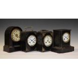 Four assorted ebonised mantel clocks