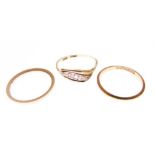 Three assorted gold rings