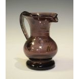 Early 19th Century amethyst glass baluster cream jug