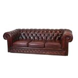 Wine deep-buttoned Chesterfield settee