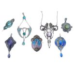 Collection of five Art Nouveau pendants,