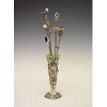 Victorian silver vase with thirteen hat pins
