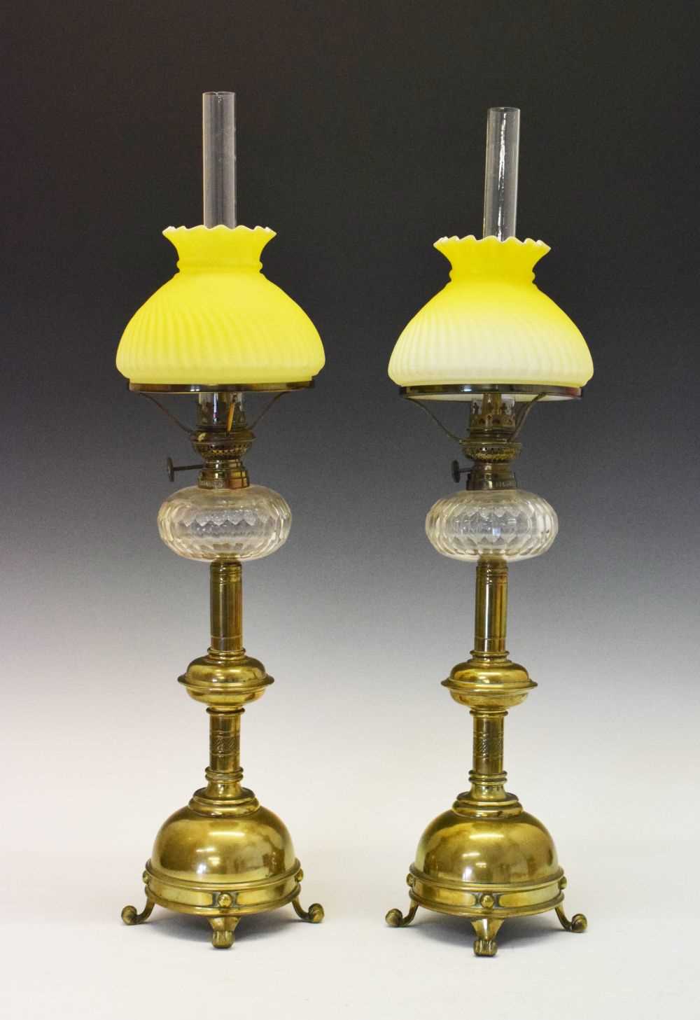 Pair of brass oil lamps