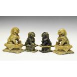 Pair of Chinese carved green soapstone Dogs of Fo