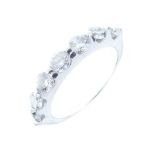 Seven stone diamond half hoop ring,