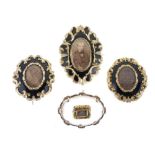 Collection of four Victorian mourning brooches