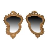 Pair of Rococo Revival giltwood and gesso wall mirrors