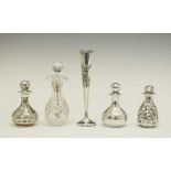 Four scent bottles and posy vase