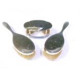 Two silver-backed dressing table brushes and oval box