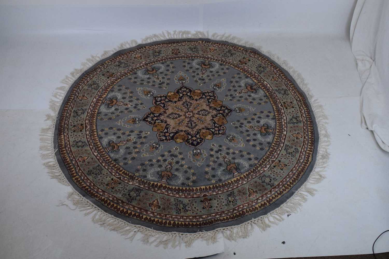 Circular blue ground wool rug with central medallion - Image 7 of 7