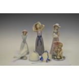 Quantity of boxed Lladro and Nao porcelain figures