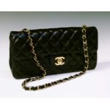 Chanel - Single flap classic handbag, quilted black lambskin