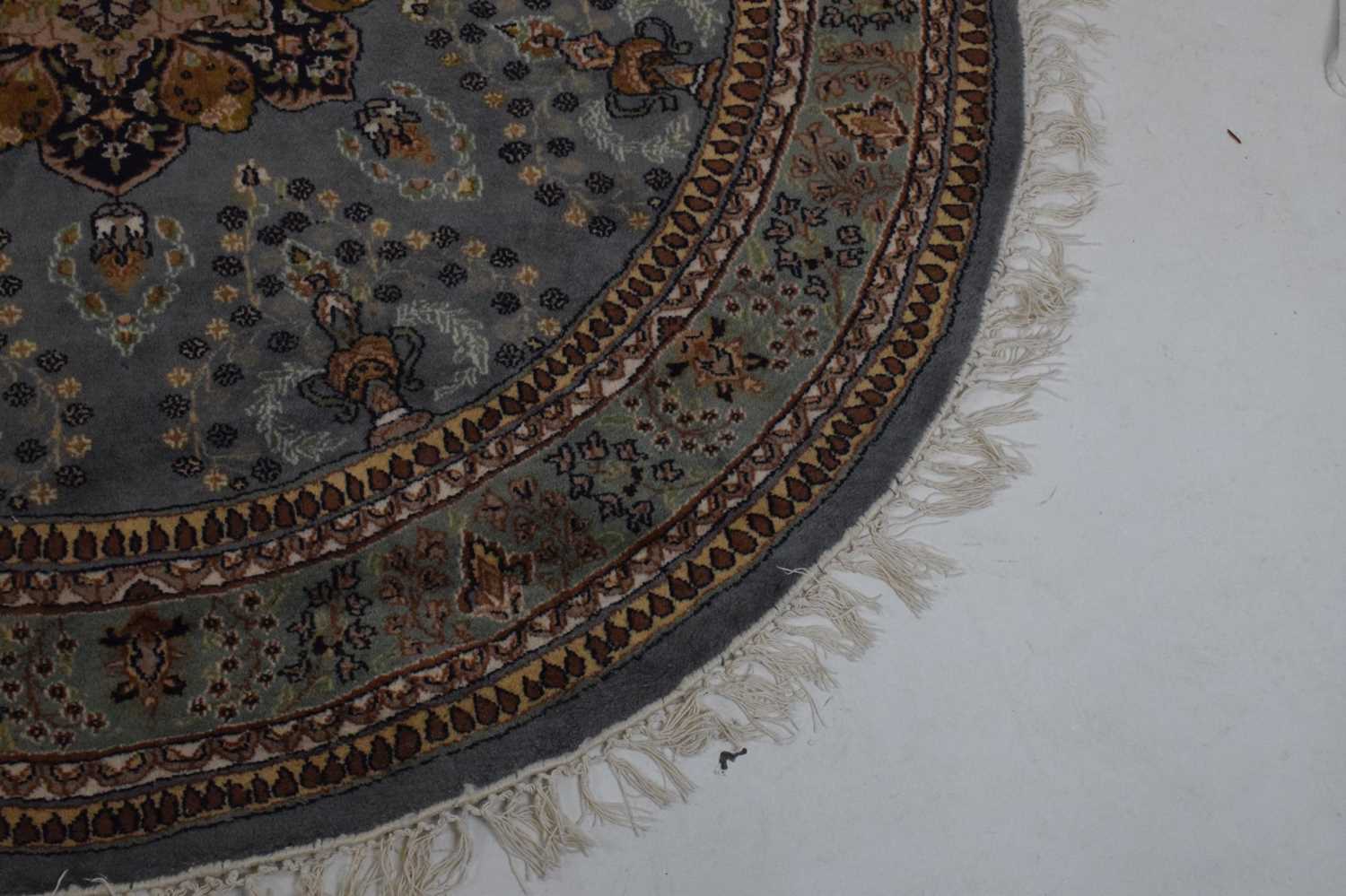 Circular blue ground wool rug with central medallion - Image 5 of 7